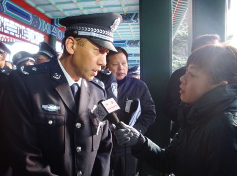 李江赴京参加海地地震遇难中国维和警察追悼会